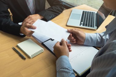 Boss received a letter of resignation from subordinate on the ta