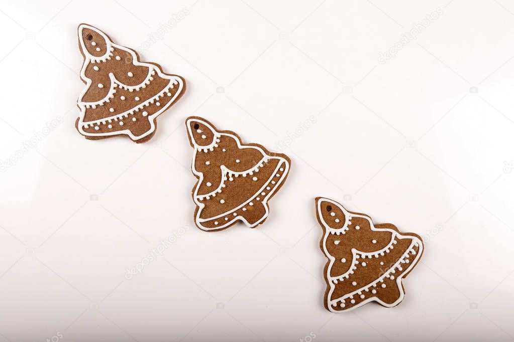 Christmas cookies, gingerbread In the form of a Christmas tree isolated white background. Christmas background