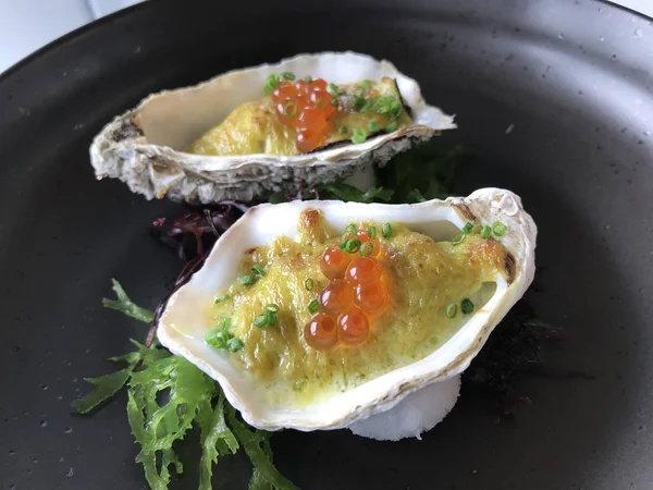 Paar gebakken oesters Stockfoto