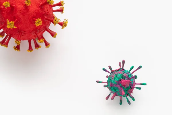 两张彩色3D病毒模型的照片 受到2020年Covid 19封锁的启发 免版税图库图片