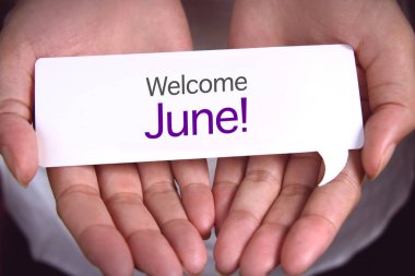 El gösteren karşılama Haziran.