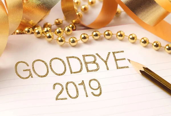 Goodbye 2019 with gold decoration.