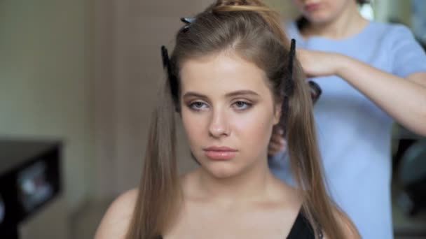 Hairdresser Makes The Final Stage Of Creating A Hairstyle For A