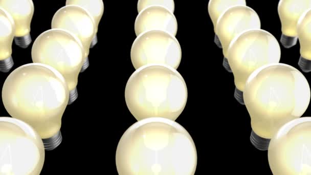 黒の背景のアニメーションに電球が点灯 — ストック動画