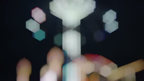 Defocused Bokeh Lights Made Scary Attractions Spinning Luna Park — Stock Video
