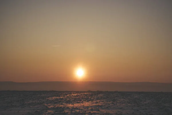 Gün batımında Kar Sahası