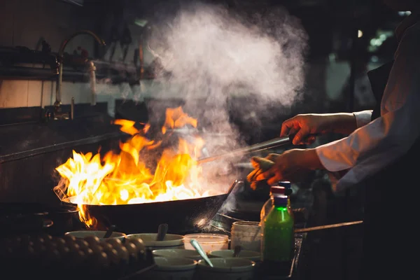 Chef stirring cooking — Stock Photo, Image