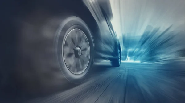 Tires is spin of speeding car — Stock Photo, Image