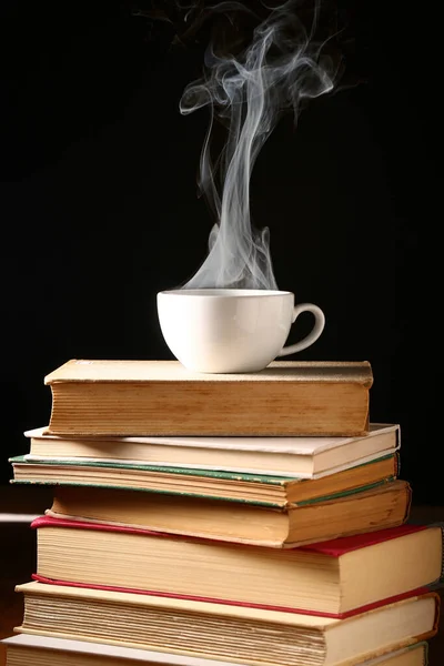 White Cup of coffee on book