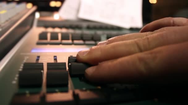 Male hands using sound and light digital mixer at a concert — Stock Video