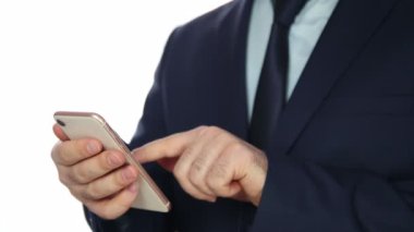 Cep telefonu kullanan iş adamı