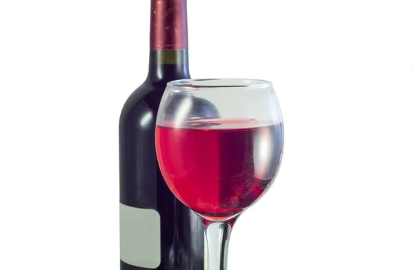 Bicchiere Vino Rosso Primo Piano Una Bottiglia Vino Sullo Sfondo — Foto Stock