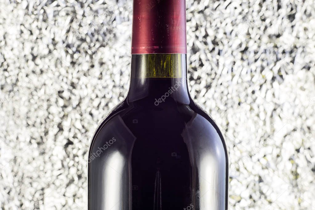 Bottle of wine close up on gray background