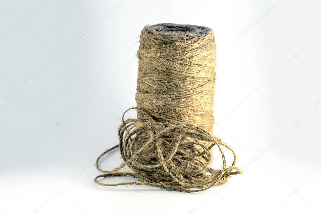 Natural fiber rope on a light gray background