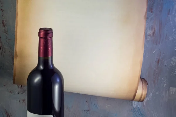 Bottle of wine on the background of an old paper scroll