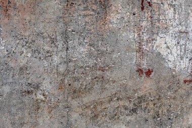 Arka plan olarak binanın boyalı beton tabanı