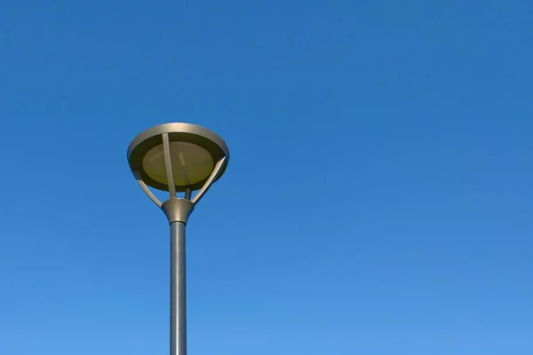 Street lamp against a clear sky, minimalism