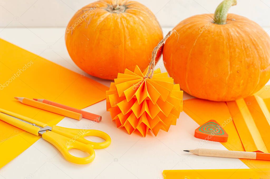 Autumn crafts. Thanksgiving crafts. Pumpkin made of paper. DIY.