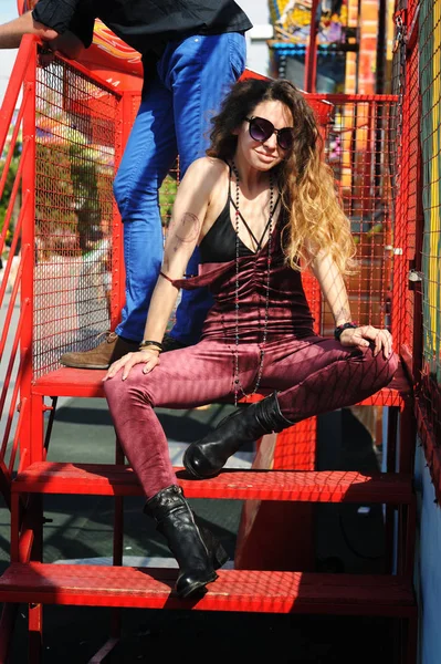 Stylish woman portrait, dressed in dark red velor overalls — Stock Photo, Image