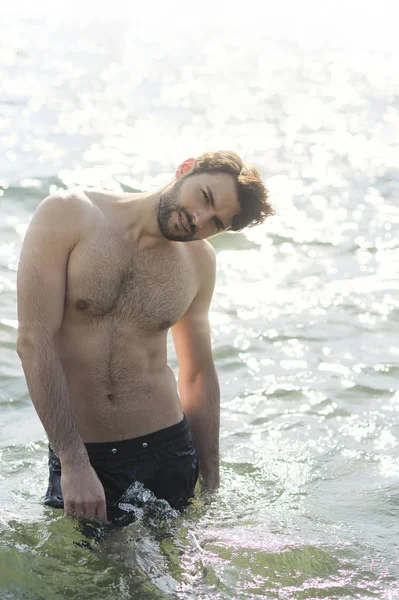 Young stylish man portrait near the sea — Stock Photo, Image