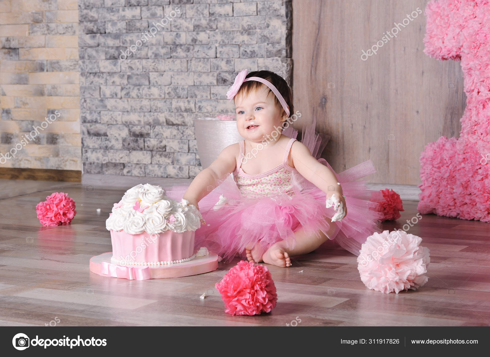 Cute baby eating cake for first birthday Baby girl in dress Festive decor  in pink colors Stock Photo by OlhaRomaniuk