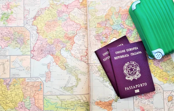 two Italian European passports,  suitcases