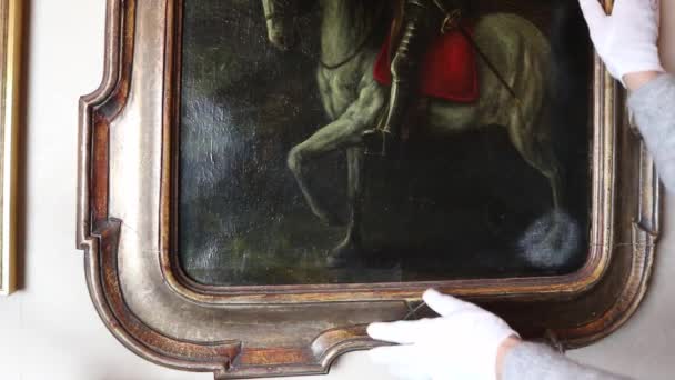 Person Wearing White Gloves Hangs Ancient Paintings Private Museum Italy — Stock Video