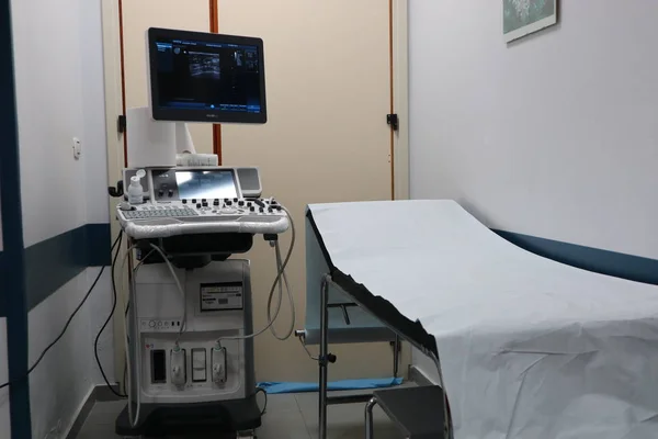 Empty hospital hallway with surgical transport equipment