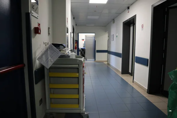 Empty hospital hallway with surgical transport equipment