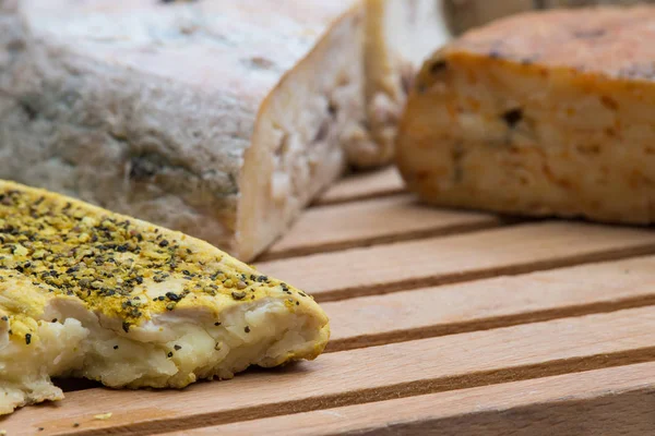 A board of French cheeses. — Stock Photo, Image