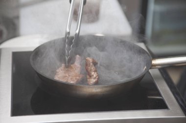 Kuzu soyut resim bir arka plan olarak kullanmak üzere yemek ellerini Şef