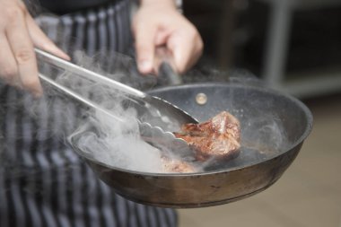 Kuzu soyut resim bir arka plan olarak kullanmak üzere yemek ellerini Şef