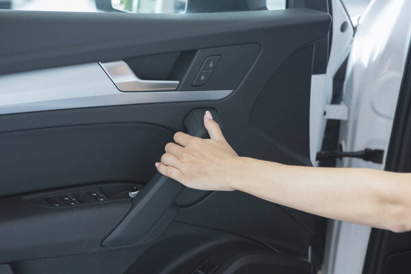 Beautiful successful girl sitting in the car Beautiful red sports car
