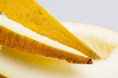 Bir sarı honeydew kavun dilimi görüntünün arka plan olarak kullanılan tohum olmadan