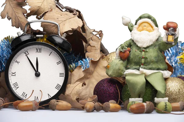 Christmas installation with decorations, a clock and a figure of Santa Card