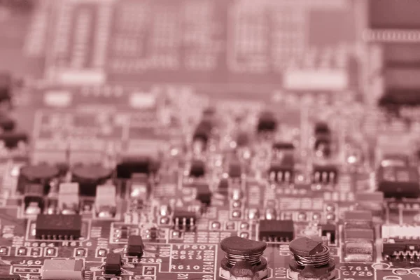 Close-up of electronic circuit board with processor Toned image — Stock Photo, Image