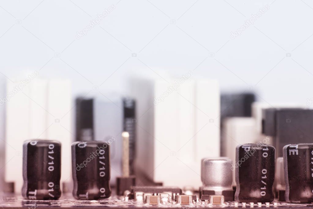 Electronic components are mounted on the device board Chips diodes capacitors chokes Toned image