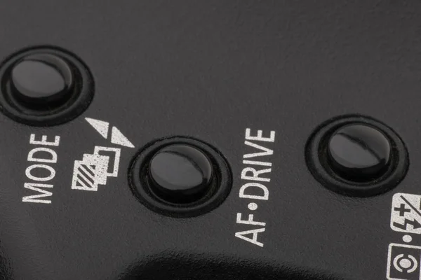 Camera mode selector buttons. Buttons used to select between automatic and semi automatic modes of modern photo cameras and some analog cameras. — Stock Photo, Image