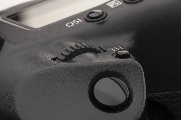 Close-up macro shot of a modern digital SLR camera. Detailed photo of black camera body with a classic wide aperture portrait lens — Stock Photo, Image