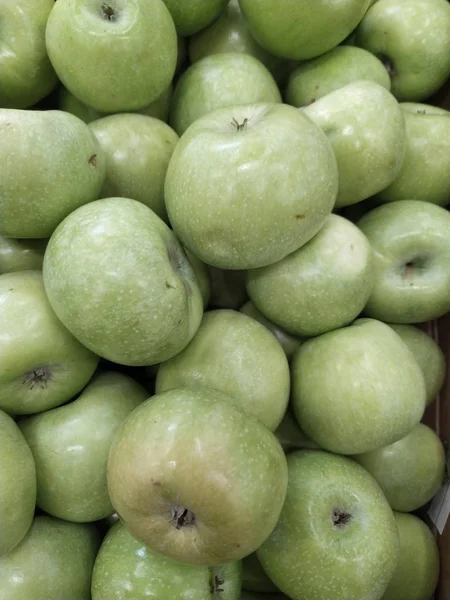 Granny smith green apples. Raw fruit background. Top view.