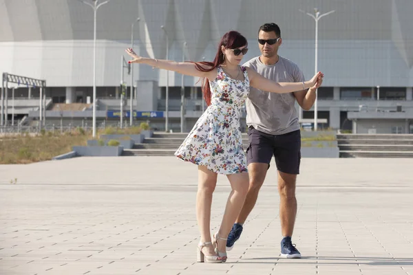 Young couple dances Caribbean Salsa. Social activity concept.