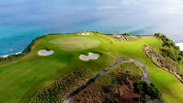 Aerial View Luxury Golf Field Next Cliff Ocean Beach Bali Stock Video