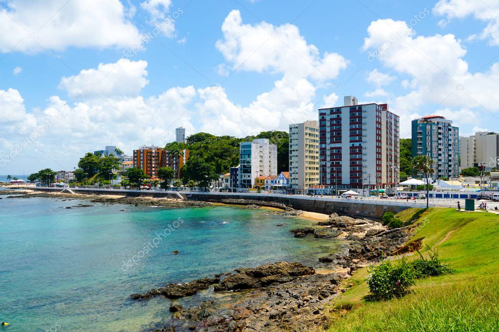 Coastline city of Salvador Bahia, Brazil. Boardwalk coast next the Barra lighthouse and Santa Maria Fort. 