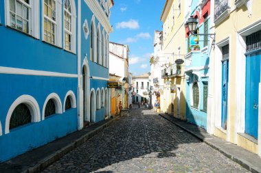 Colorful colonial houses at the historic district of Pelourinho. The historic center of Salvador, Bahia, Brazil. Historic neighborhood famous attraction for tourist sightseeing, little shops and restaurant. clipart