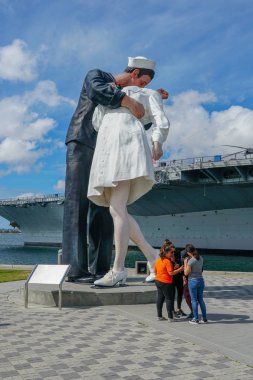 Kissing sailor statue, Port of San Diego. also known as Unconditional Surrender recreates famous embrace between a sailor and a nurse celebrating the end of second world war.  clipart
