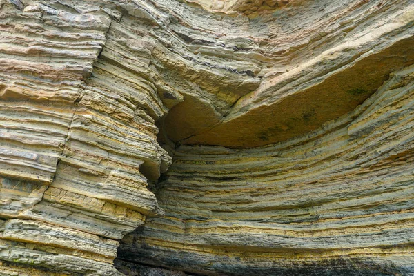 Park rangers at the Point Loma tide pools. Layers of rock in the sandstone of tide pool area, part of the Cabrillo National Monument in San Diego, CA. USA