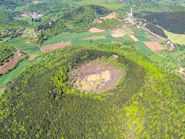 The Santa Margarida Volcano is an extinct volcano in the comarca of Garrotxa, Catalonia, Spain. The volcano has a perimeter of 2 km and a height of 682 meters in Garrotxa Volcanic Zone Natural Park clipart