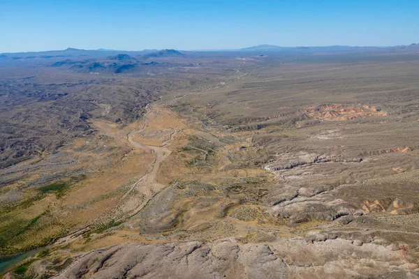 Aerial view of desert next the Lake Mead in Mohave County, Arizona, United States. Arid endless desert during hot summer season