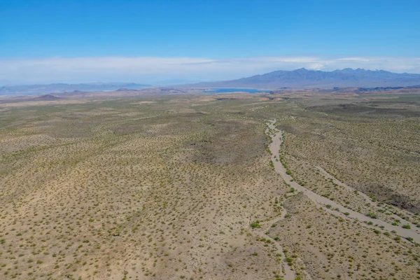 Aerial view of desert next the Lake Mead in Mohave County, Arizona, United States. Arid endless desert during hot summer season