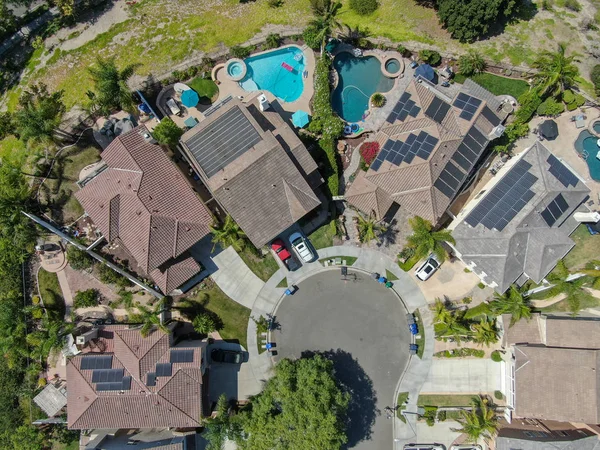 Aerial top view suburban neighborhood with  big villas next to each other in Black Mountain, San Diego, California, USA. Aerial view of residential modern subdivision luxury house.